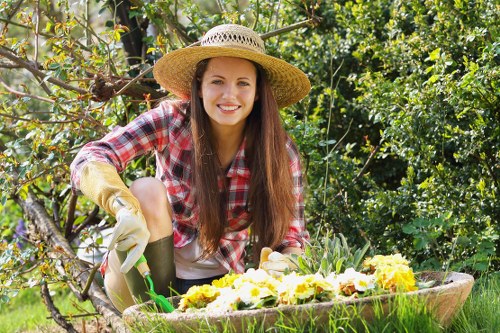 Gardeners Berrylands completing garden work with safety procedures in place